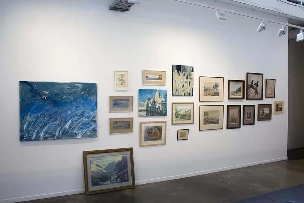 Mixed group of artwork on gallery wall at Depot as part of Pre-Loved Re-Loved