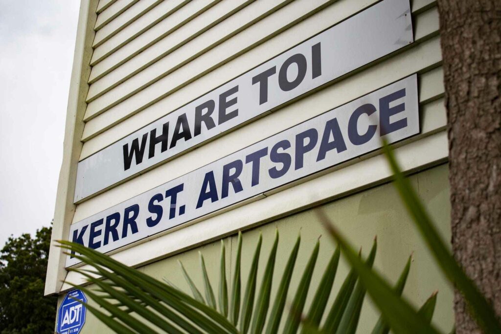 Photo of Whare Toi's front signage.